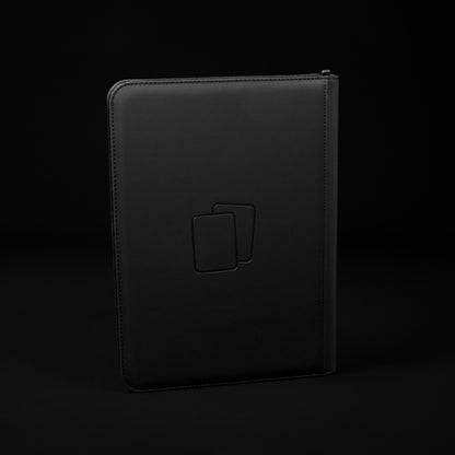 Back view of black COVRD card album standing upright showing the debossed logo asset.