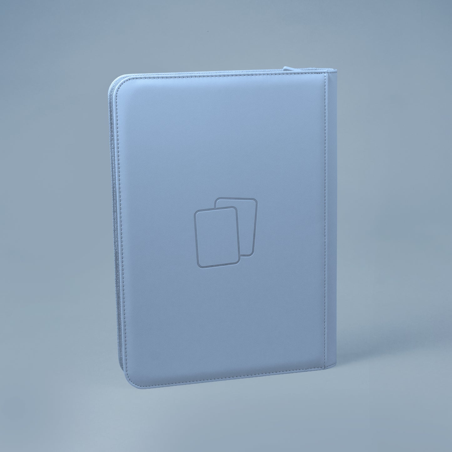 Back view of steel blue COVRD card album standing upright showing the debossed logo asset.