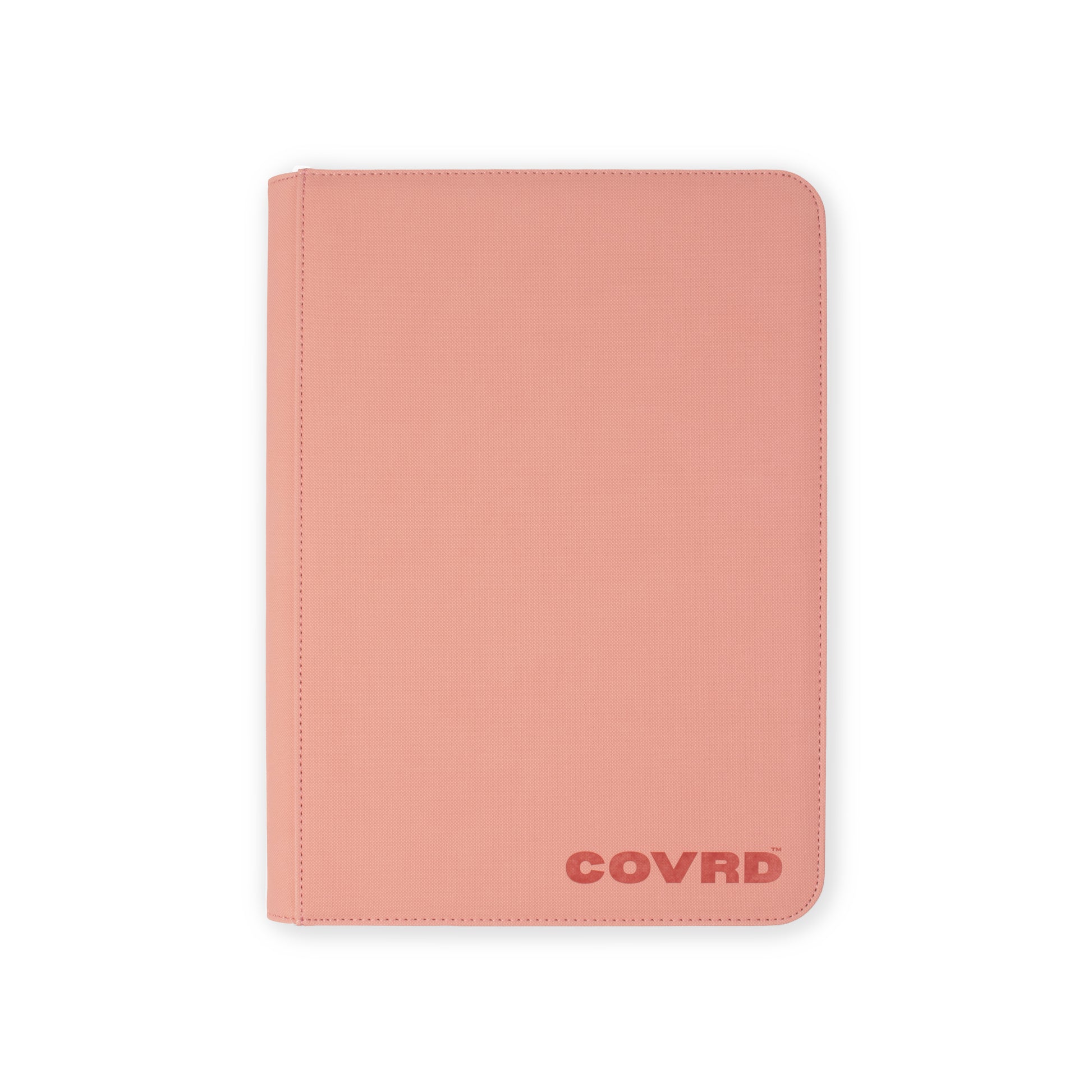 Front view of COVRD premium trading card zip binder in blush pink with embossed logo.