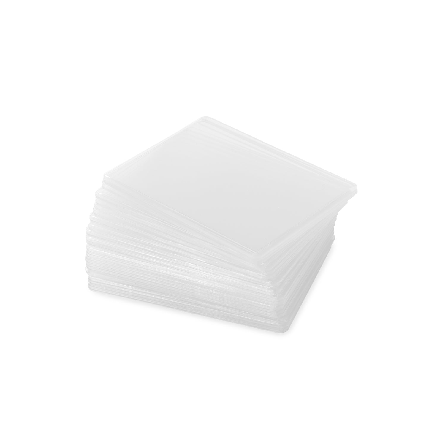 A neat stack of clear, rigid 3x4 plastic card toploaders for trading card protection.