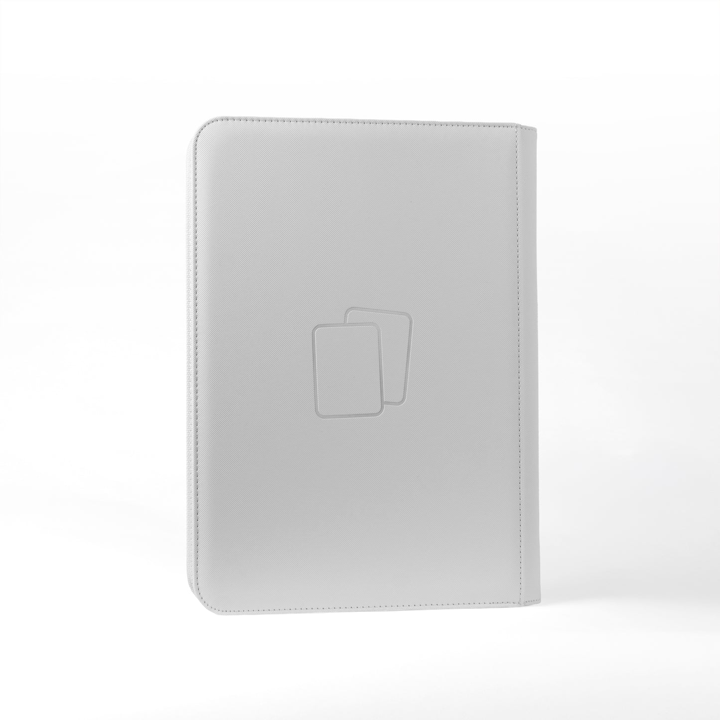 Back view of white COVRD card album standing upright showing the debossed logo asset.